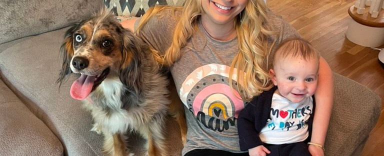 mom with dog and baby